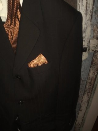 Trajes de novio negro con raya cobriza .completo