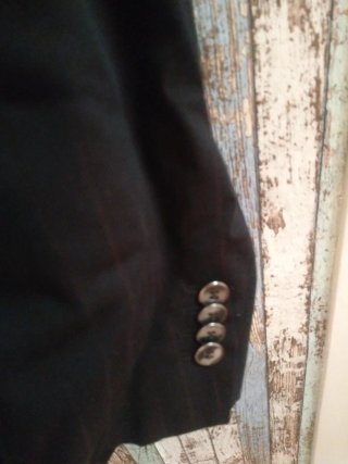 Trajes de novio negro con raya cobriza .completo