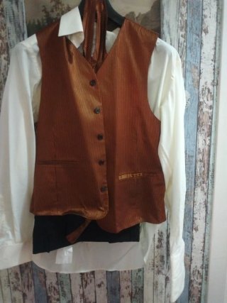Trajes de novio negro con raya cobriza .completo