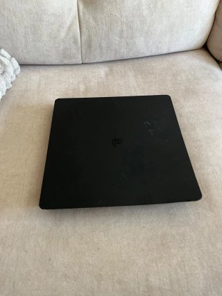 PS4 Slim Negra con juegos