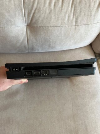 PS4 Slim Negra con juegos