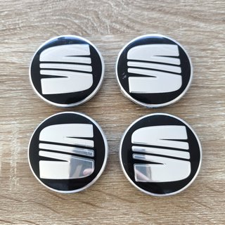 TAPABUJES SEAT 56mm NEGROS CON EMBLEMA PLATA