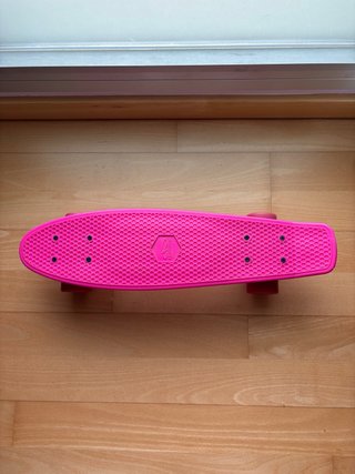 Monopatín rosa