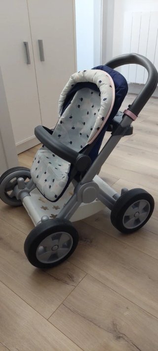 Carro de muñecas con estampado floral