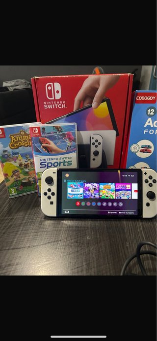Nintendo Switch OLED Bianca con 3 giochi
