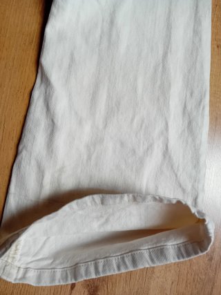 Pantalones vaqueros beis acampanados