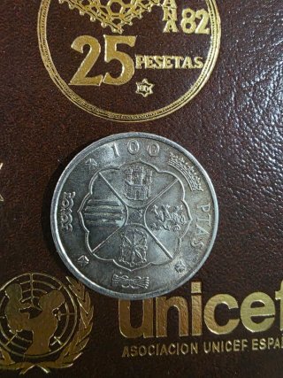 Moneda de plata 1966 y Libro monedas 82