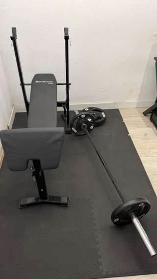 Banco Mobiclinic + barra olímpica + 50 kg discos