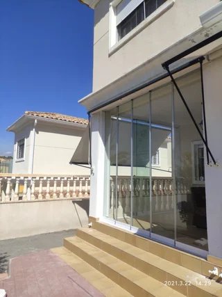 Cerramiento de Cristal Corredero sin Perfil