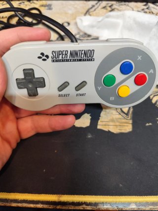 Mando Super Nintendo (SNES) en caja