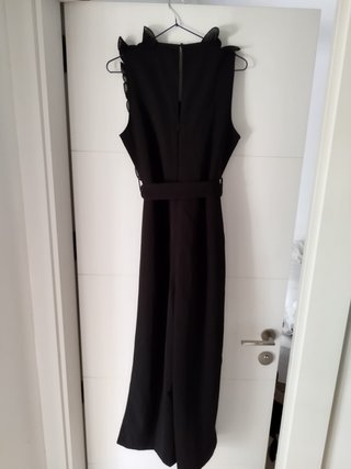Enterizo elegante negro con volantes