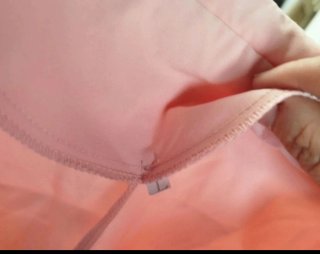 Blazer rosa elegante con botón negro