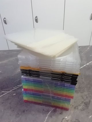 35 Cajitas de cd delgadas nuevas y usadas