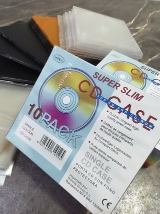 35 Cajitas de cd delgadas nuevas y usadas