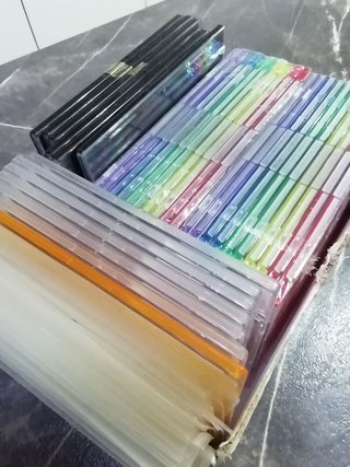 35 Cajitas de cd delgadas nuevas y usadas