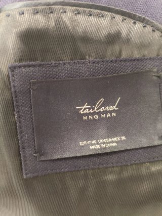 Chaqueta de traje azul marino MANGO MAN.