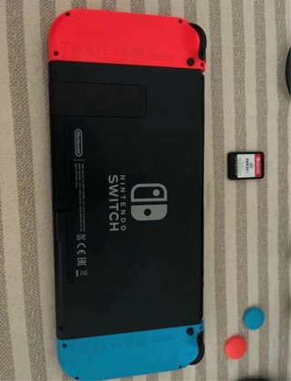 Nintendo Switch + FIFA 22 + Accessori