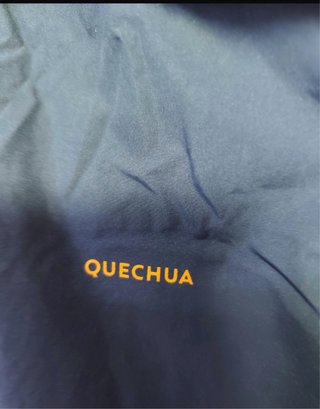 Cortavientos Quechua azul y amarillo