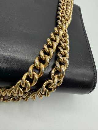 Bolso Louis Vuitton WOC Lock Negro