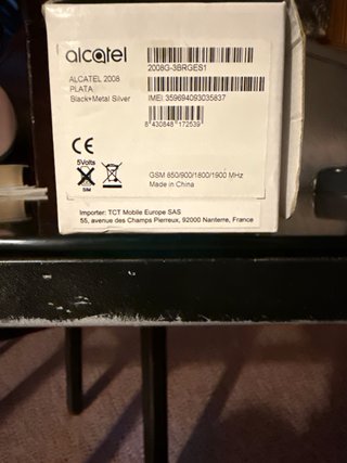Teléfono Alcatel con base de carga
