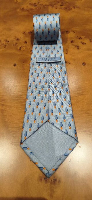 CORBATA LOEWE, SEDA NATURAL, SERIE FLORA, CELESTE.