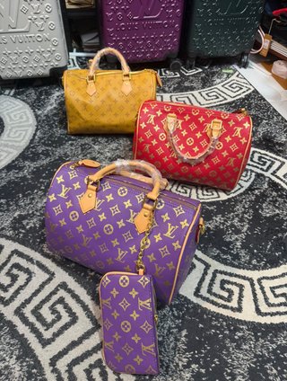 Bolso Louis Vuitton Morado y Dorado