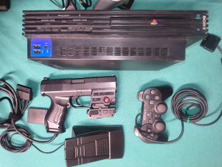Lote PlayStation 2 (PS2) con pistola logic3 y mas.