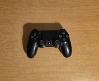 PlayStation Slim 500Gb + Comando Sony + Jogo