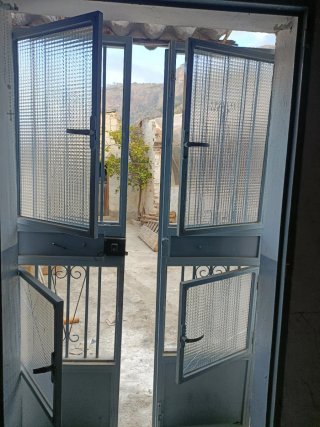 Puerta Metálica de Doble Hoja