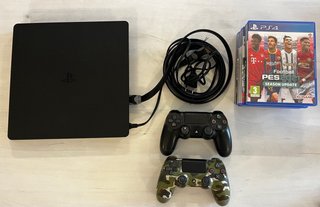 PS4 Slim Negra + 2 Mandos + 7 Juegos