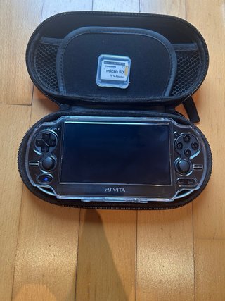 PS Vita OLED con 4 Juegos y accesorios