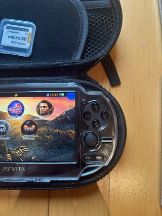 PS Vita OLED con 4 Juegos y accesorios