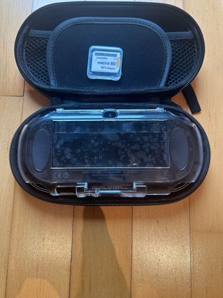 PS Vita OLED con 4 Juegos y accesorios
