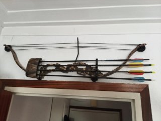 Arco de poleas infantil con flechas
