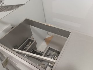 Mueble lavabo Silestone gris y blanco