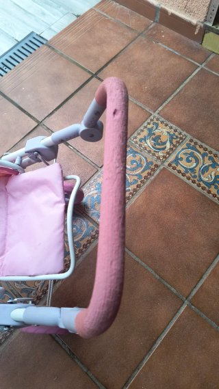 Carrito de muñecas rosa