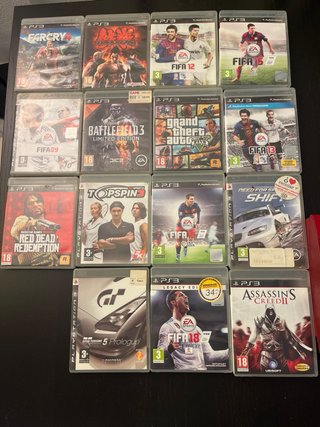 PlayStation 3 (PS3) Roja con 2 Mandos y Juegos