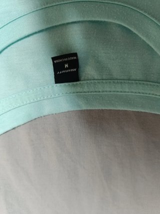 Camiseta verde con oso