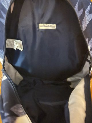 Mochila Roxy azul y marrón con estampado