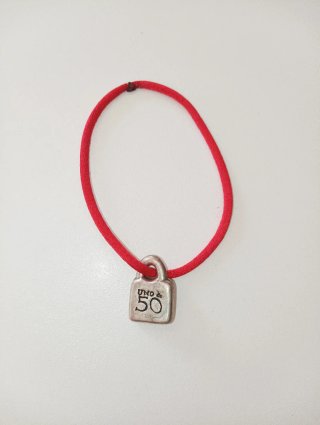 Charm Candado Uno de 50
