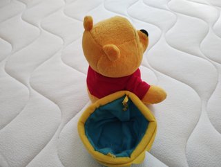 Peluche Winnie the Pooh con cestino