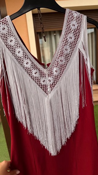 Traje de flamenca rojo con flecos