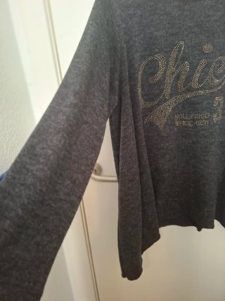 Jersey gris con detalle Chic