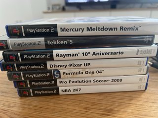 PlayStation 2 Slim Negra + 7 Juegos