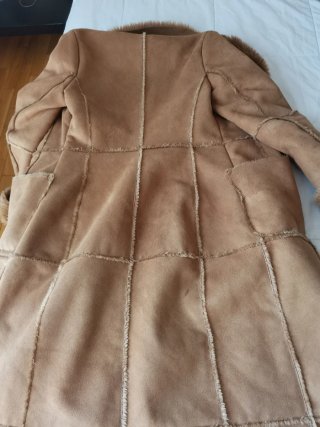 Abrigo efecto ante Zara