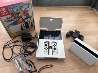 Nintendo Switch OLED Mario Bros Wonder