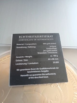 Moneta commemorativa Tutankhamun in bagno d'oro