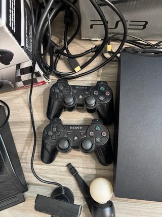 PS3 Slim 320GB + Volante + 2 Mandos + 14 Juegos