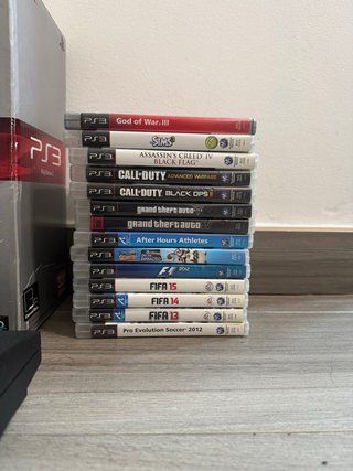 PS3 Slim 320GB + Volante + 2 Mandos + 14 Juegos