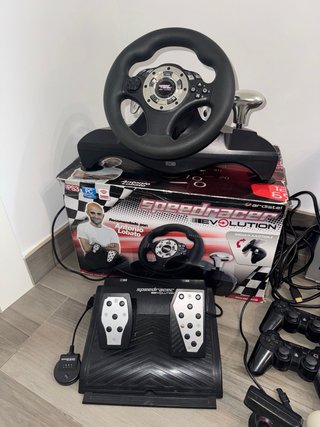 PS3 Slim 320GB + Volante + 2 Mandos + 14 Juegos